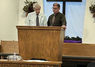 Pastor Paul and founding member John (Jack) Oberlin